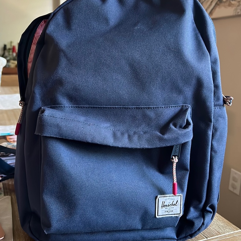 Blue Herschel backpack